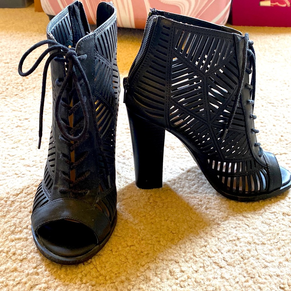 Never worn laser cut black heels